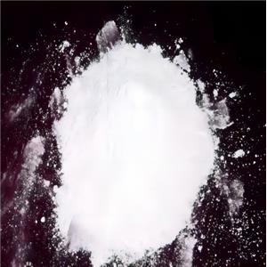 5-Pyrimidinecarboxylic acid, 2-chloro-4-(1-methyl-1H-indol-3-yl)-, 1-methylethyl ester